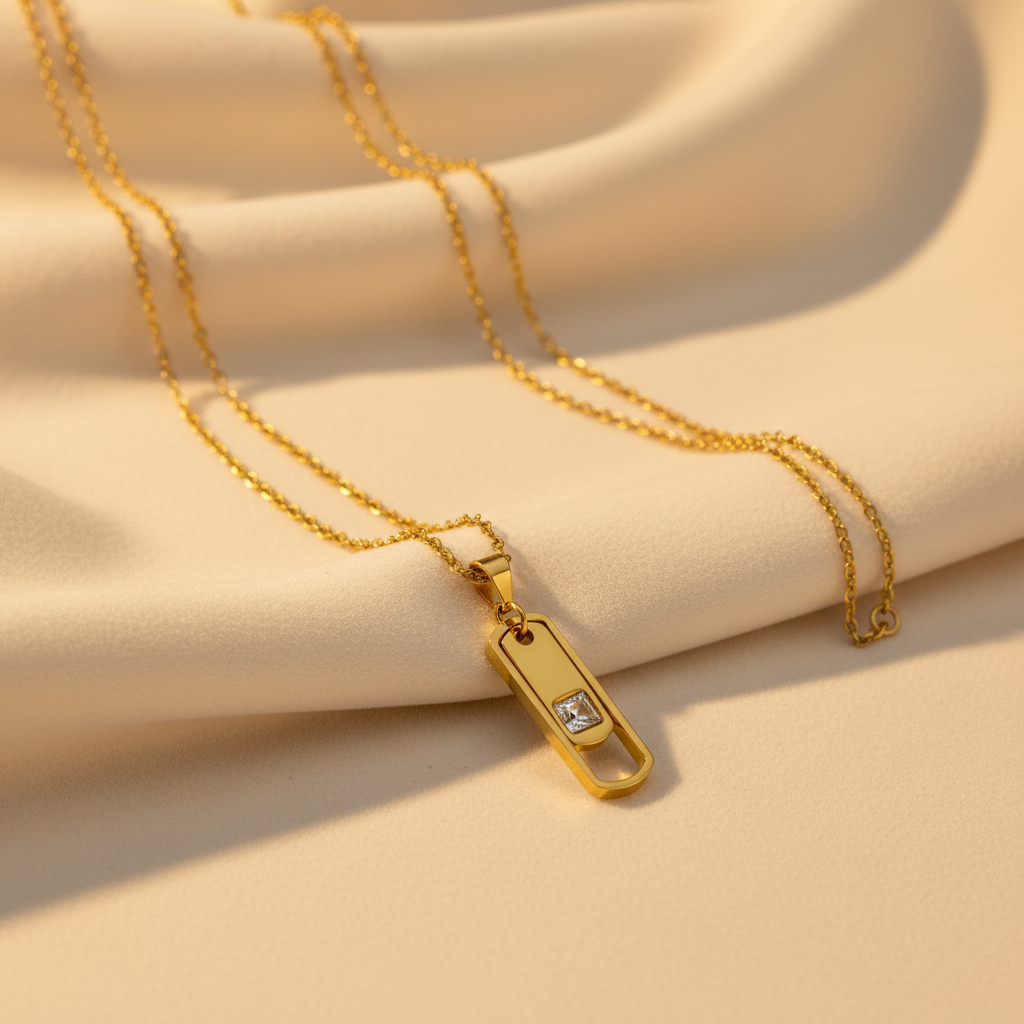 Dog tag pendant on cream background