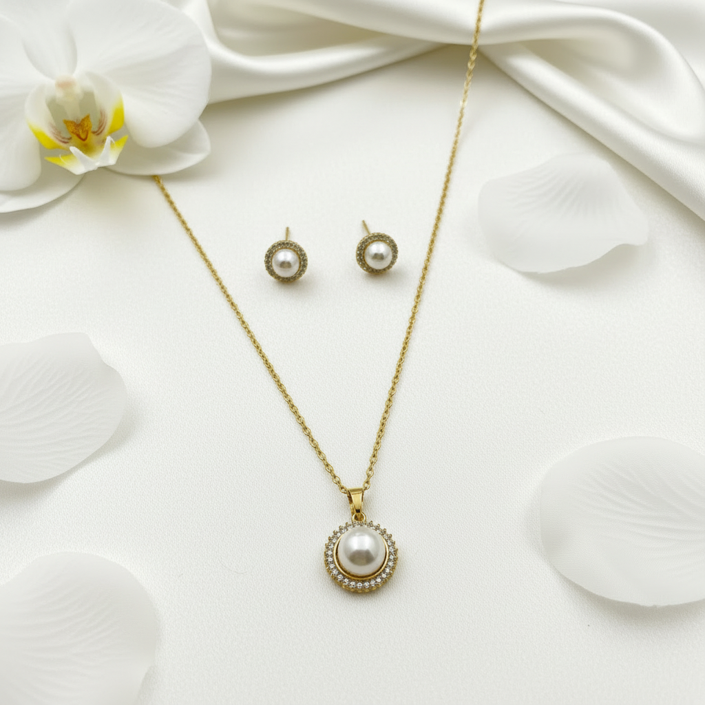 Pearl jewelry set overhead on cream silk with roses