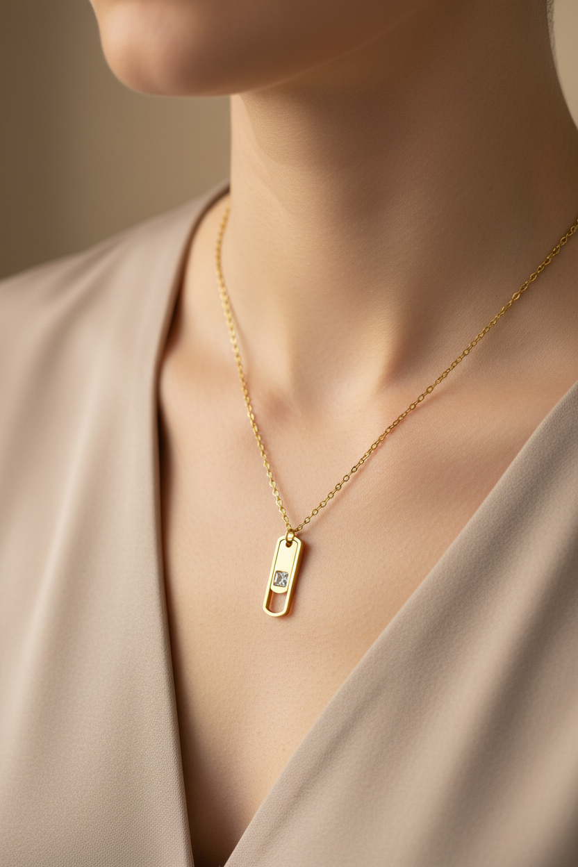 Dog tag pendant on woman's neckline closeup