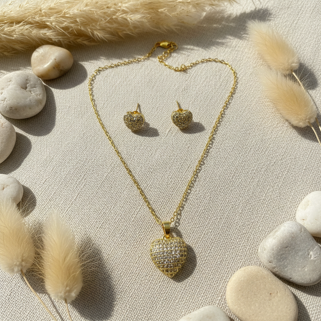 Heart jewelry set diagonal overhead on beige linen