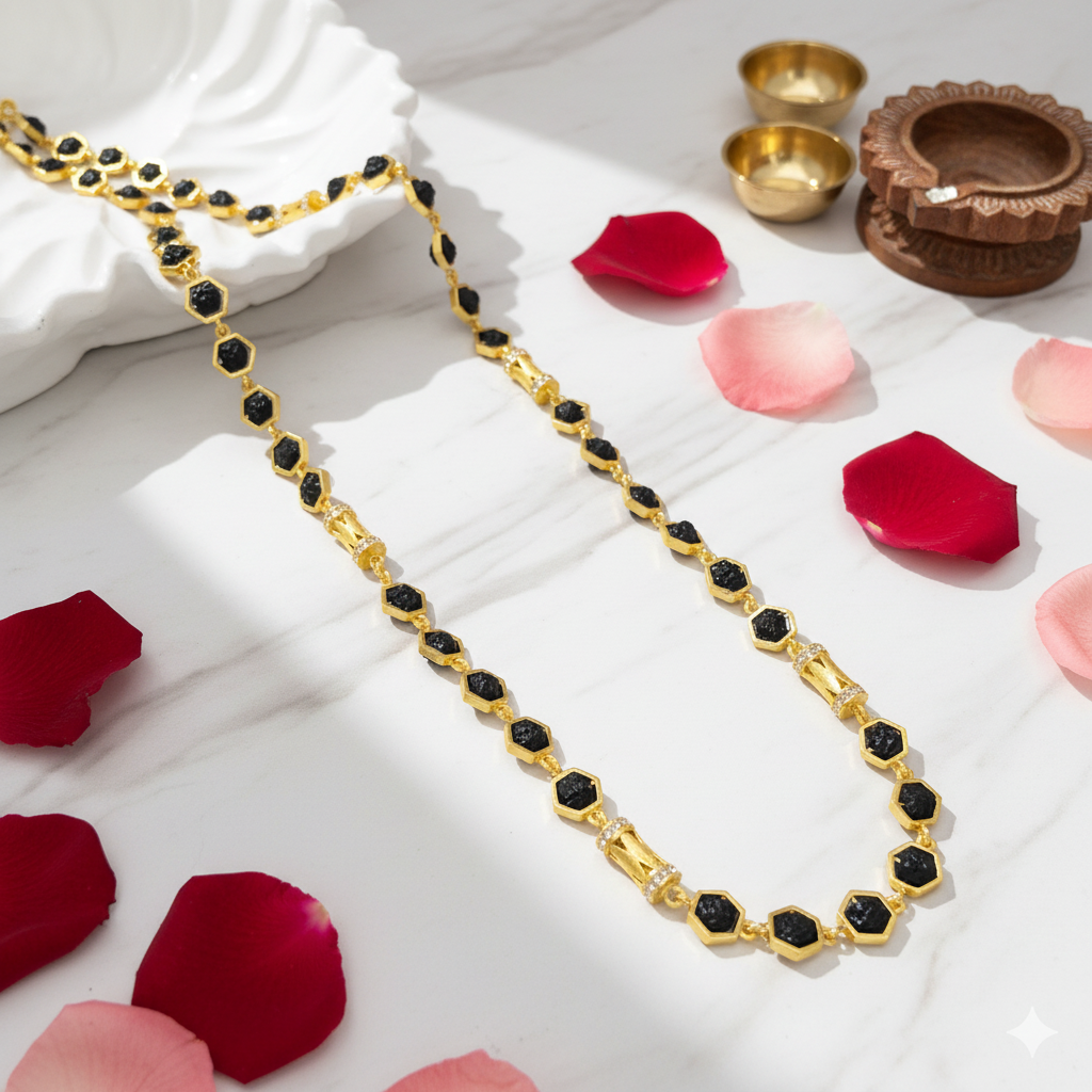 Hexagonal mala on white marble with rose petals