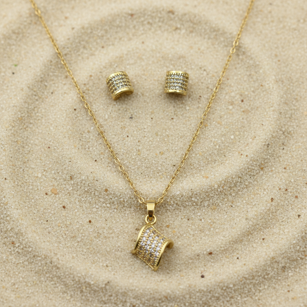 Jewelry set on sand background with studio lighting
