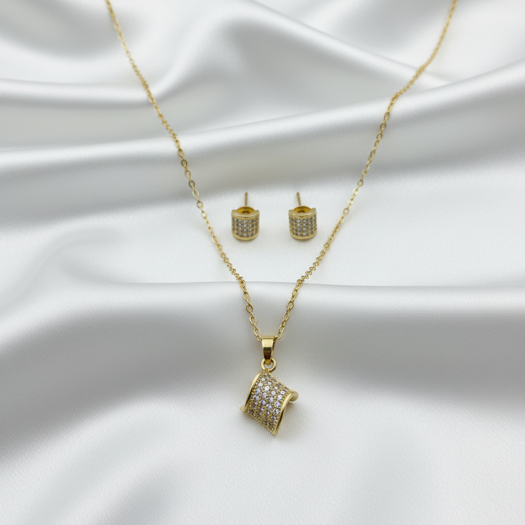 Jewelry set on white silk with high-key lighting