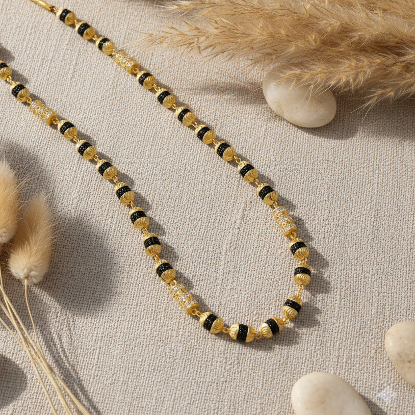 Mala on beige linen with pampas grass