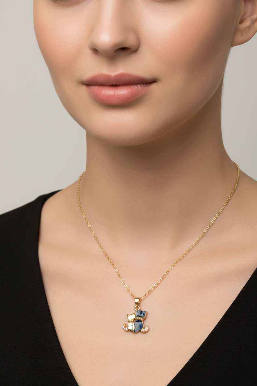 Model wearing cat pendant necklace closeup