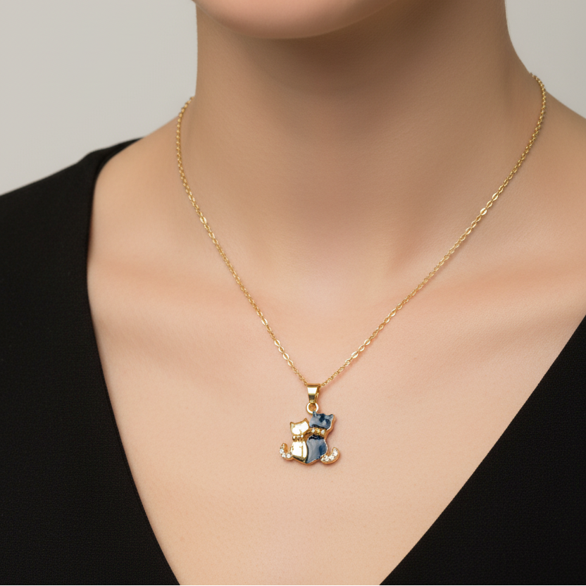 Model wearing cat pendant necklace closeup
